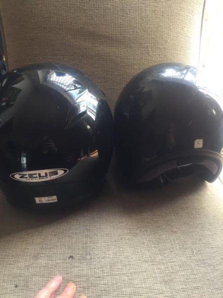 Two open-faced helmets