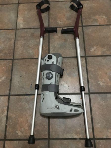 Moonboot and crutches for sale