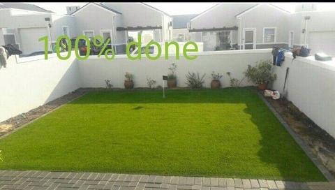 ARTIFICIAL LAWN AND PEBBLES STONES