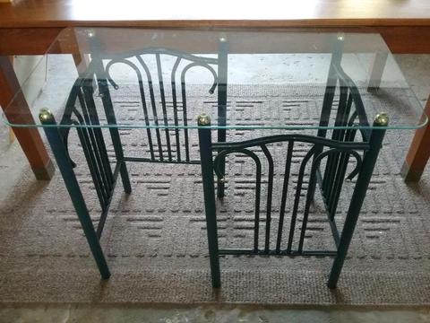 Table with glass top and metal base