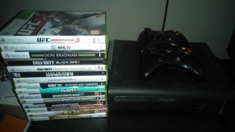 Xbox 360 with 2 controls and 14 games