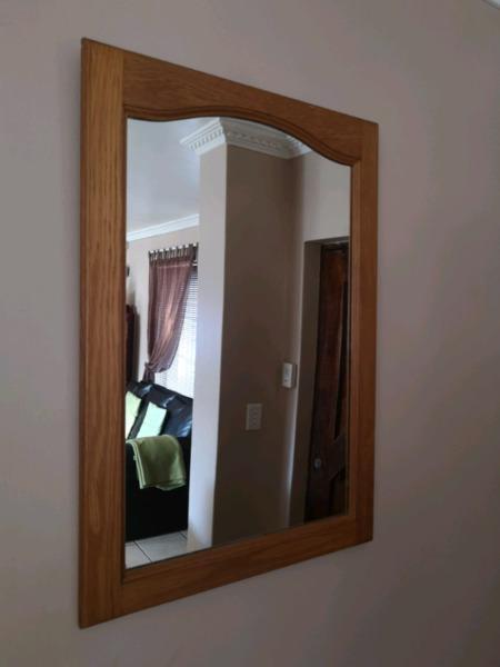 Mirror in solid wooden frame
