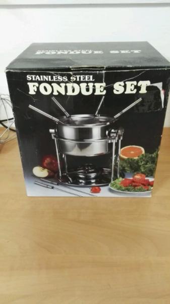 Two stainless steel fondue sets for sale