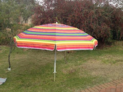 Beach umbrella with stand