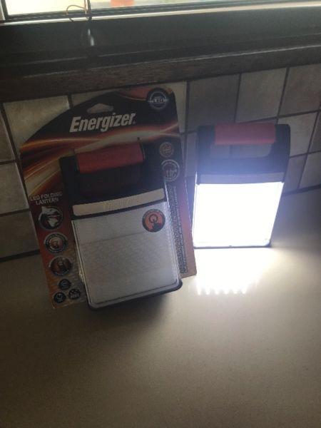 2 ENERGIZER LED FOLDING LANTERS 1 BRAND AND PACKED THE OTHER AS NEW
