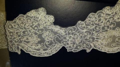 Bridal lace. Bridal buttons. Invisible zips