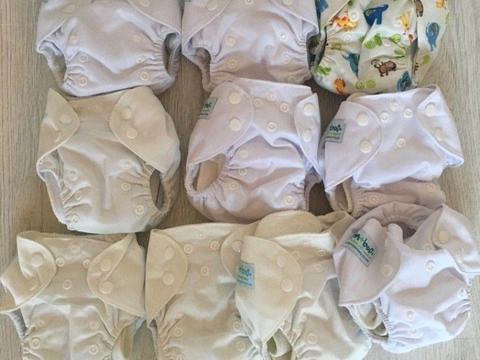 Barely used cloth nappies for sale