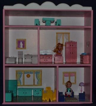 Wooden Dolls House Includes furniture and 2 small dolls as seen in photo