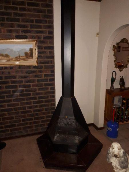 Large Jet master fireplace with chimney for sale + free bakkie load of fire wood