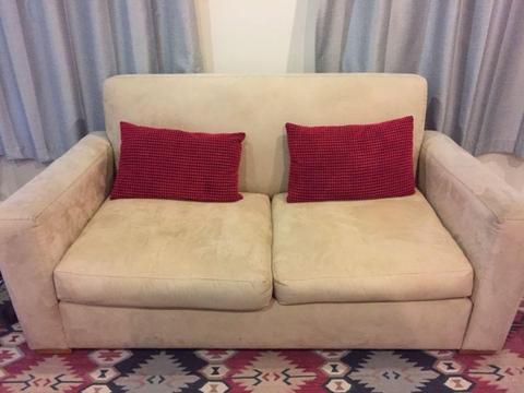 Two solid comfy suede couches: Urgent Sale