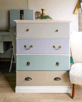 Painted drawers in muted colours