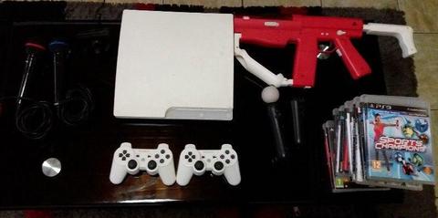 Sony PlayStation 3 white slim 320gig with 15 games, & Ps Move bundle for sale