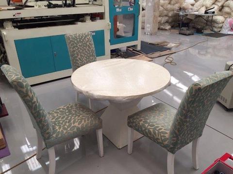 Round dining room table and 5 chairs