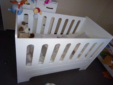 White wooden cot