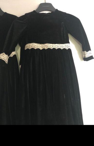 Two black velvet dresses