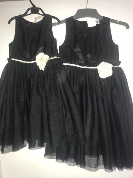 Two black dresses