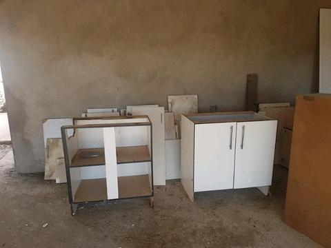 Cupboards, stove and old microwave