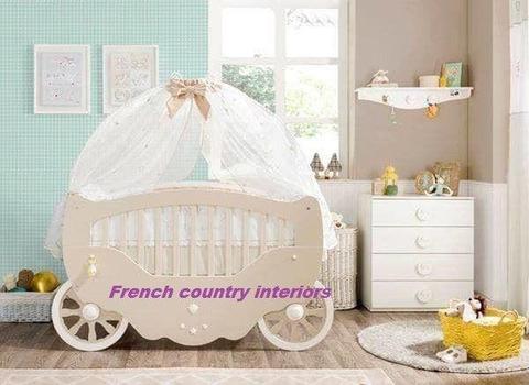Cot in a carriage design