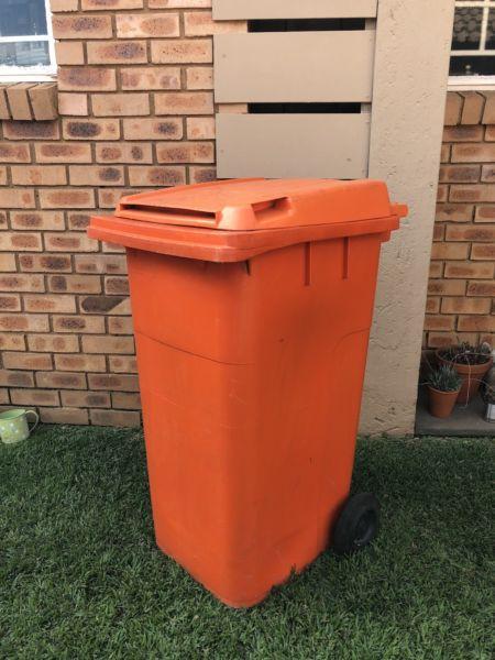 Orange wheelie bin for sale