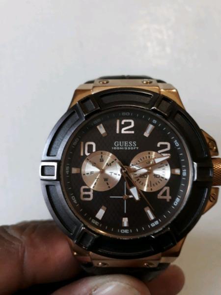 Two original mens guess watches to swop for phone of same value