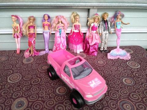 Barbies and Barbie car