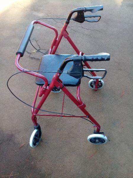 Four wheel walker with brakes