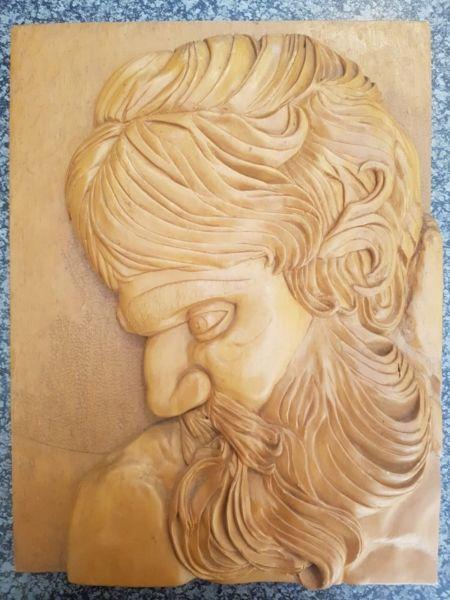 Handcarved wooden wall sculpture