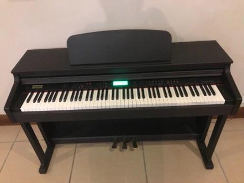 Piano - Clavitech electronic piano with multi functions and weighted keys for sale