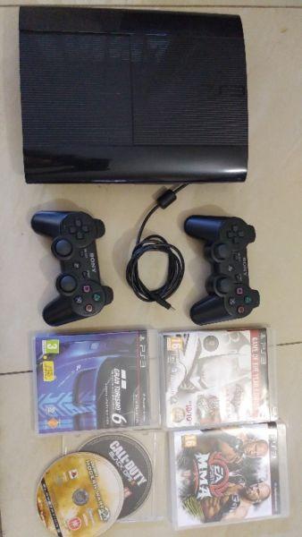 500gb slim playstation 3,2 controllers and 5 games