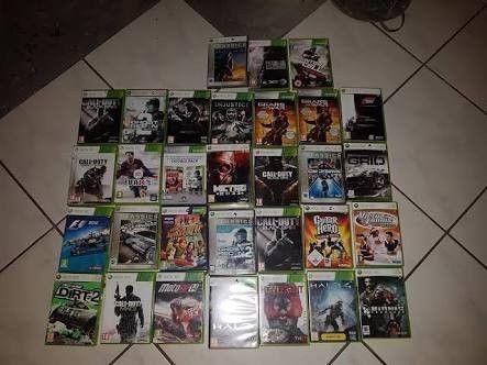 Xbox with 32 games, 3 controllers and 1wireless wheel - good condition