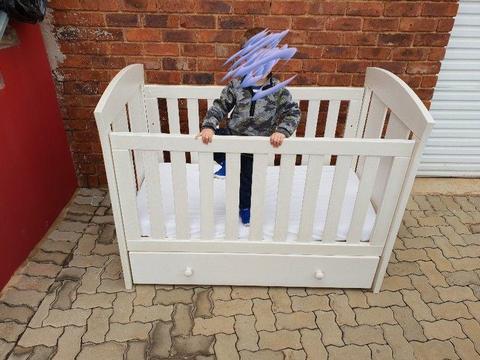White wash wooden cot with fitted draws