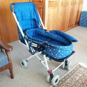 Kraft baby stroller and carry cot
