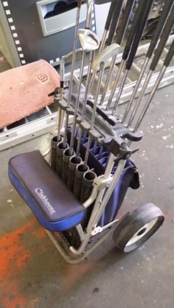 Golf trolley with clubs