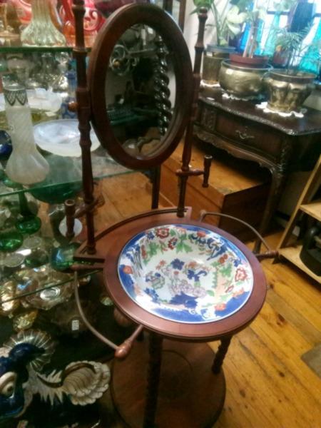 Victorian washbasin on a stand with mirror