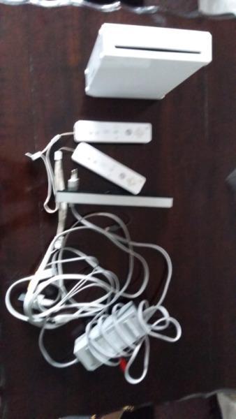 Wii console with 7 games and nun chuck urgent