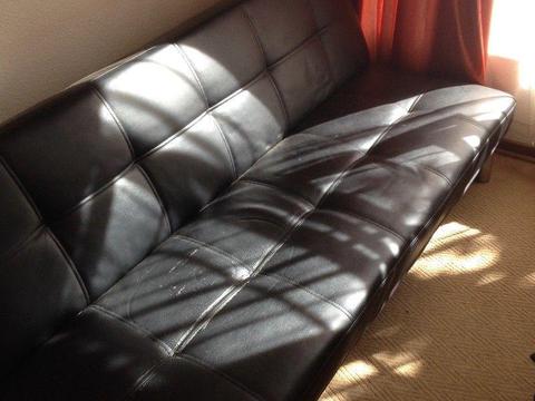 Black leather sleeper couch