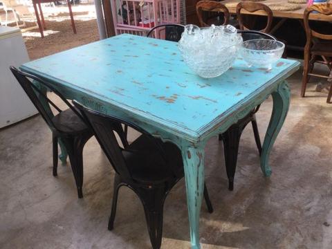 Antique oak French table and it extends if you have more guests, it is a draw leaf table