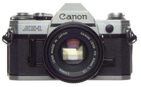 AE-1 CANON Analog vintage SLR film camera 35mm with a 1.8 f=50mm Prime lens MINT condition strap cap
