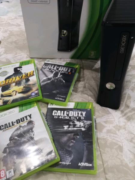 XBOX 360 slim with 4 games