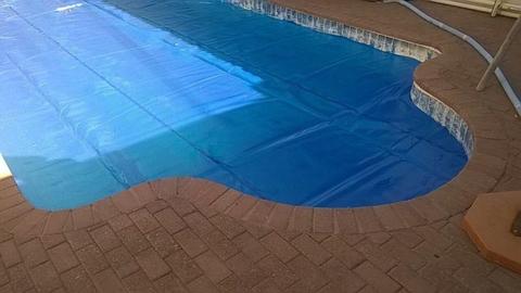 SWIMMING POOL COVERS AND BLANKETS