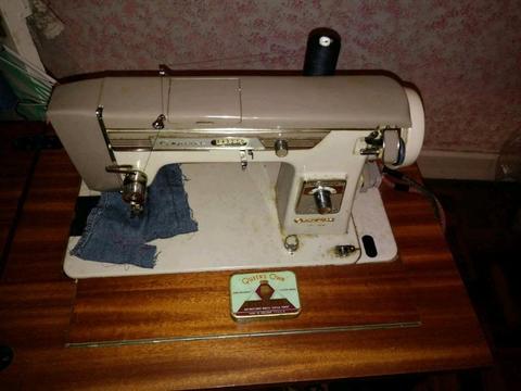 Electrical sewing machine with cabinet for sale