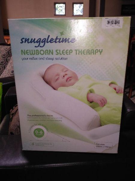 Baby sleep positioner for cot