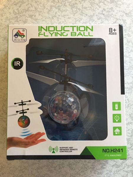 Induction flying ball