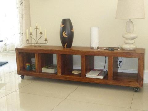 Wood console with wheels