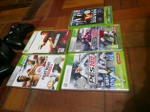 Xbox 360 slim 500gb with 5 games and 2 remotes