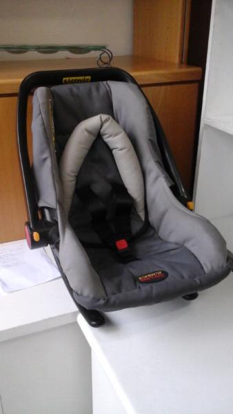 Baby car seat, baby carrier and a rocking chair