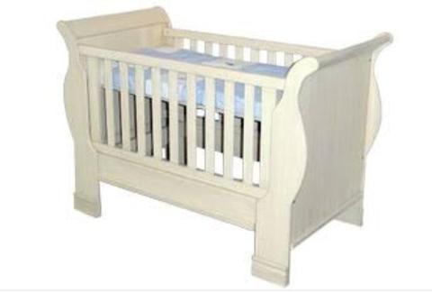 Sleigh cot with bottom drawer