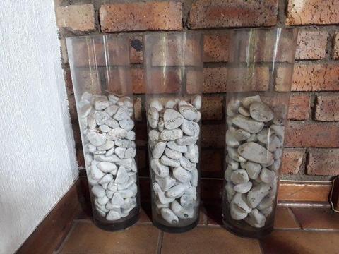Three strong glass vases & river stones