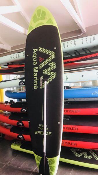 Inflatable 9’9” SUP with paddle, fin, bag and pump