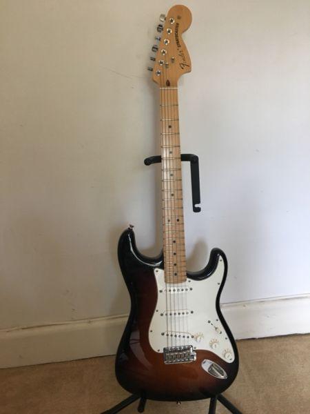 American Fender Stratocaster with hard Fender case and Fender strap
